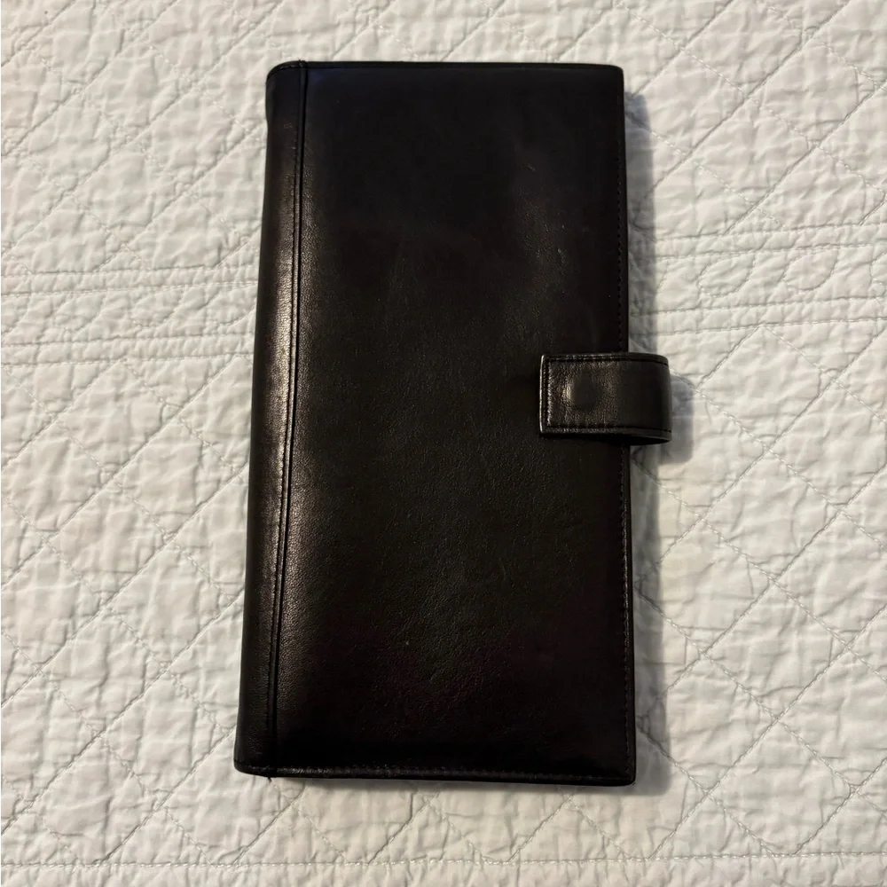 Tumi travel wallet passport card organizer.